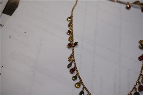 An early-mid 20th century gold and multi-coloured tourmaline drop fringe necklace, 38cm.
